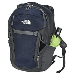 Additional Image 2 - a blue backpack with a green bottle