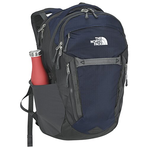Additional Image 1 - a blue backpack with a red bottle in it