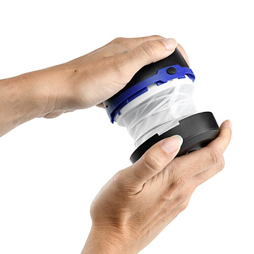 Additional Image 10 - a hand holding a blue and white object