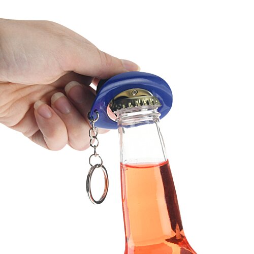 Additional Image 3 - a hand holding a bottle with a ring