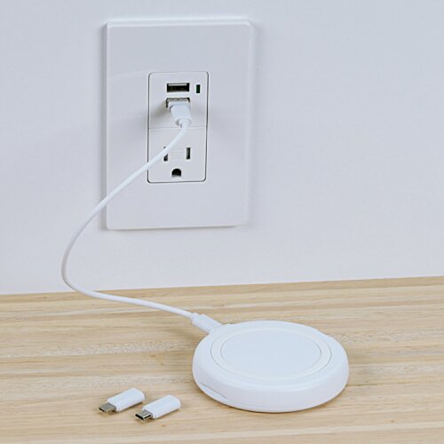 Additional Image 2 - a white device with a cord plugged into a wall outlet