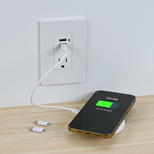 Additional Image 3 - a phone charging in a wall outlet