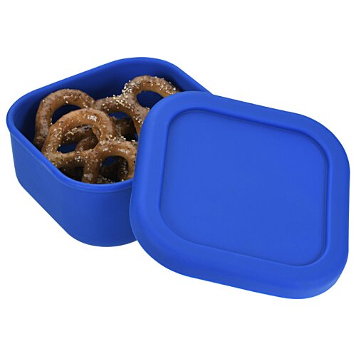 Additional Image 2 - a blue container with a blue lid filled with small brown rings