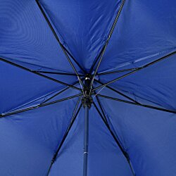 a blue umbrella with black straps