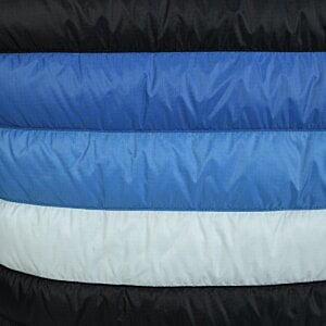Additional Image 1 - a stack of blue and black blankets