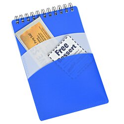 a blue spiral notebook with a spiral bound notebook
