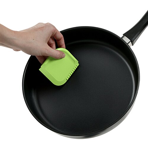 Additional Image 2 - a hand holding a sponge over a pan