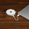 Additional Thumbnail Image 2 - a white coil of wire next to a silver laptop
