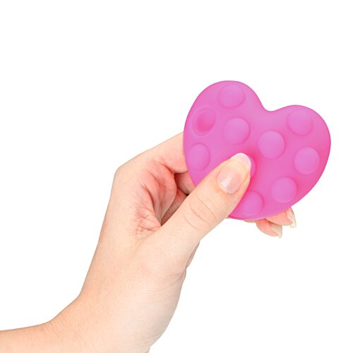 Additional Image 1 - a hand holding a pink heart