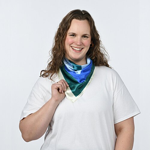 Additional Image 1 - a woman smiling with a scarf around her neck
