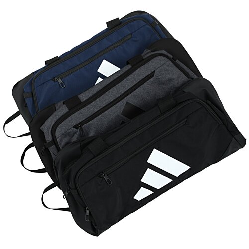 Additional Image 3 - a black and blue bag with white logo