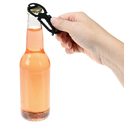 Additional Image 2 - a hand holding a bottle of liquid