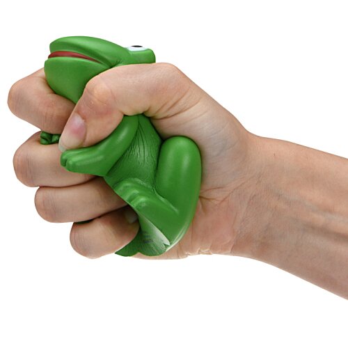 Additional Image 1 - a hand holding a green toy