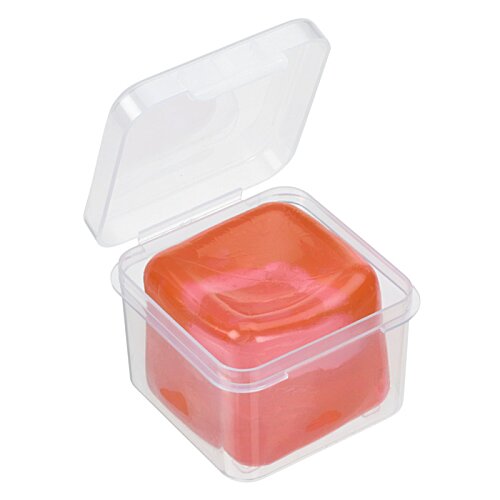 Additional Image 1 - a plastic container with an orange square object