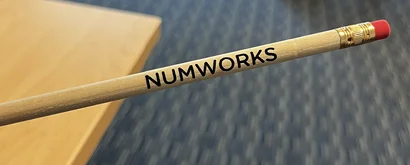 close up of a logoed pencil