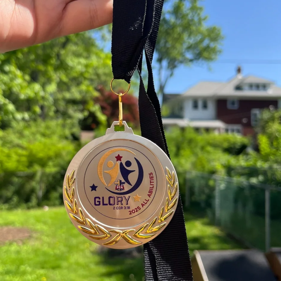 A person holding a medal