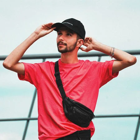 Man in Pink Crew Neck T-shirt Wearing Black Cap
