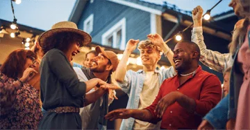 group of people celebrating at a backyard bbq
