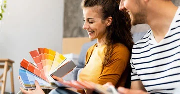 two people looking at color chips