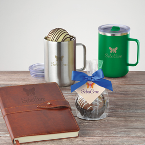 Business gift items that include journals, mugs and a hot cocoa bomb