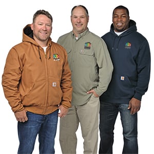 Employees wearing different work wear jackets