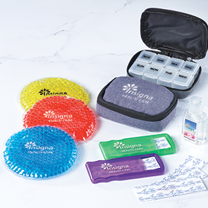 First aid produts that include bandages, pill boxes and cold packs