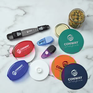 Promotional products that include pizza cutters, jar openers and chip clips