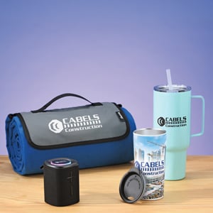 Promotional products that include a blanket, vacuum tumbler and a vacuum mug with straw
