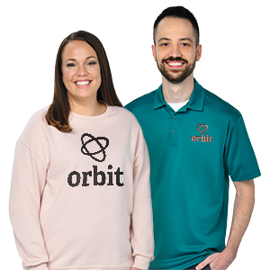 Employees wearing a polo and sweatshirt