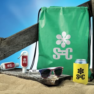 Spring promotional products that include sunglasses, drawstring bag, can holder and sunscreen