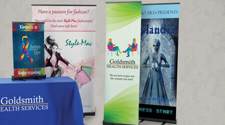 Trade show products that include table top displays, table throws and retractable banners