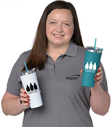 Callie holding two Colma Vacuum Tumblers with Straw