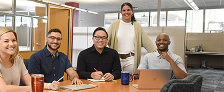 4imprint employees in business room