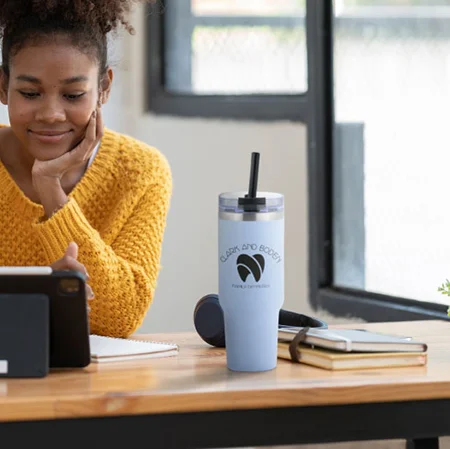 Woman drinking out of a water bottle