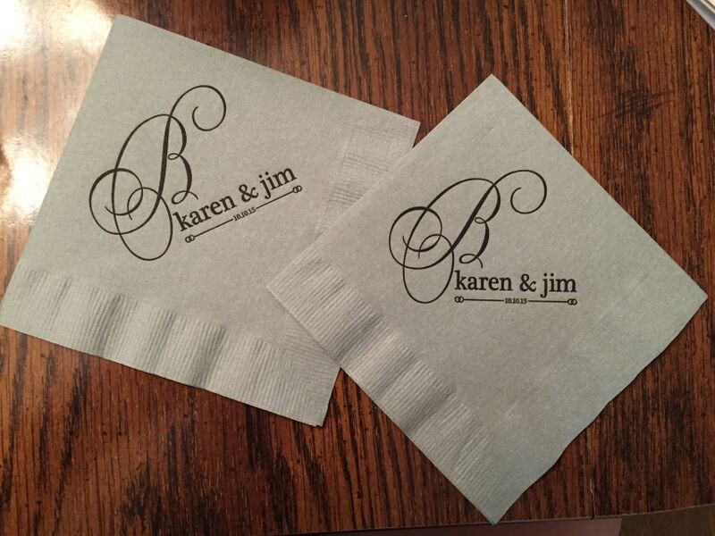 napkins with text on them on a wooden surface