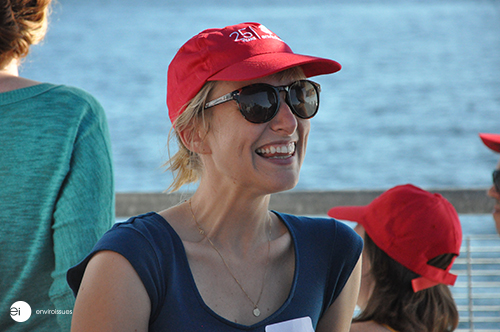 a woman wearing a red hat and sunglasses