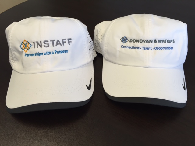 Customer photo from Barb of our Nike Performance Dri-FIT Swoosh Breathable Cap, a pair of white hats