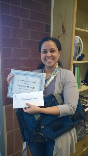 Customer photo from Jennifer of our Expedition Duffel - Polyester, a woman holding a certificate and a letter