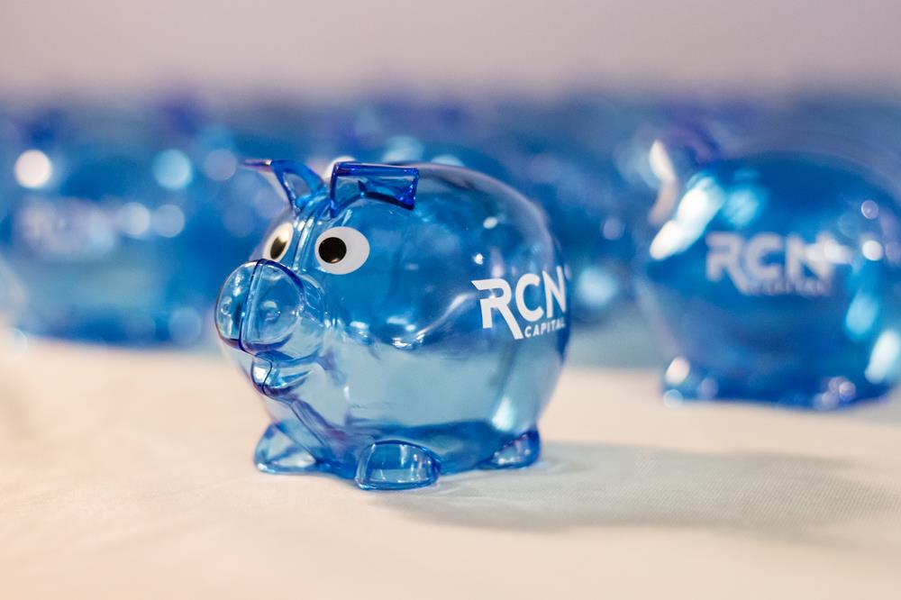 a blue piggy bank with white text