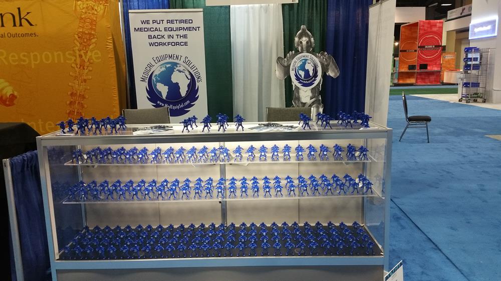 Customer photo from Bonnie of our Boogie Bot, a display case with blue toy soldiers
