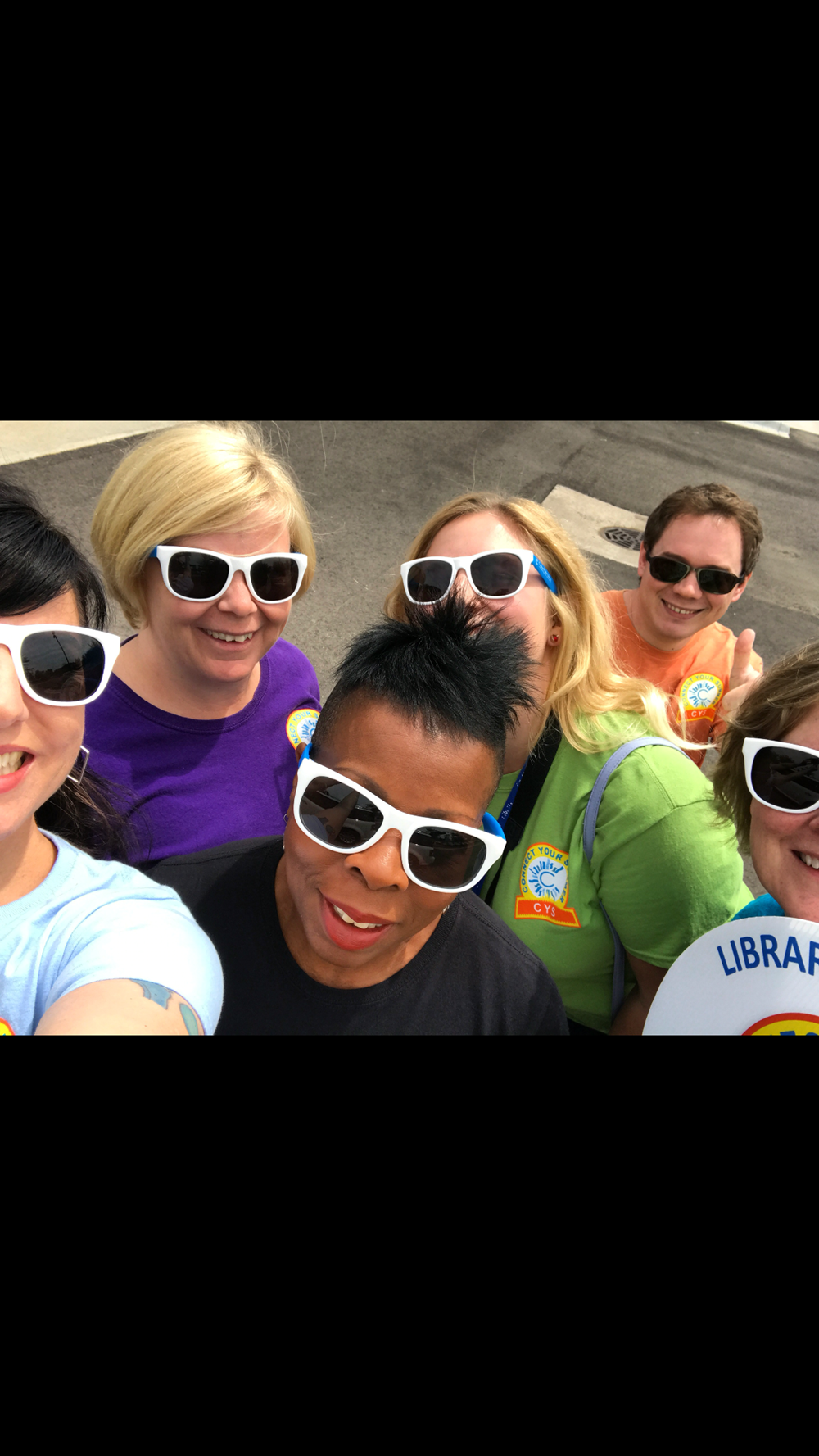 a group of people wearing sunglasses