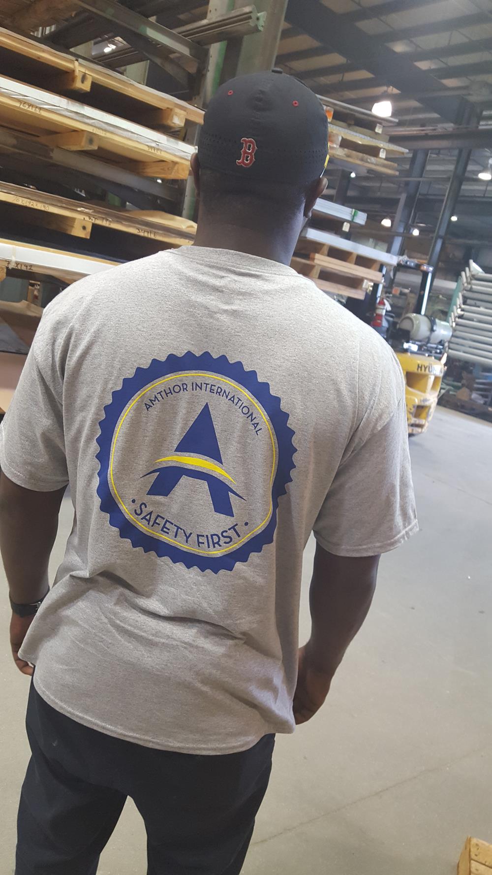 Customer photo from Adrienne of our Hanes Authentic T-Shirt - Screen - Colors, a man in a grey shirt