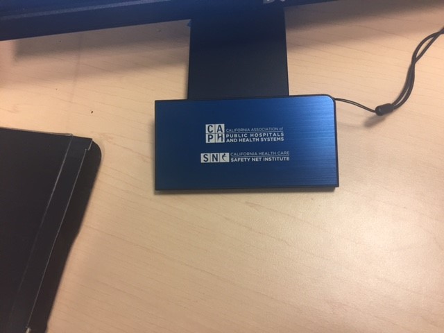 a blue rectangular object with white text on it