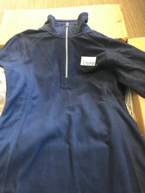 a blue jacket with a zipper