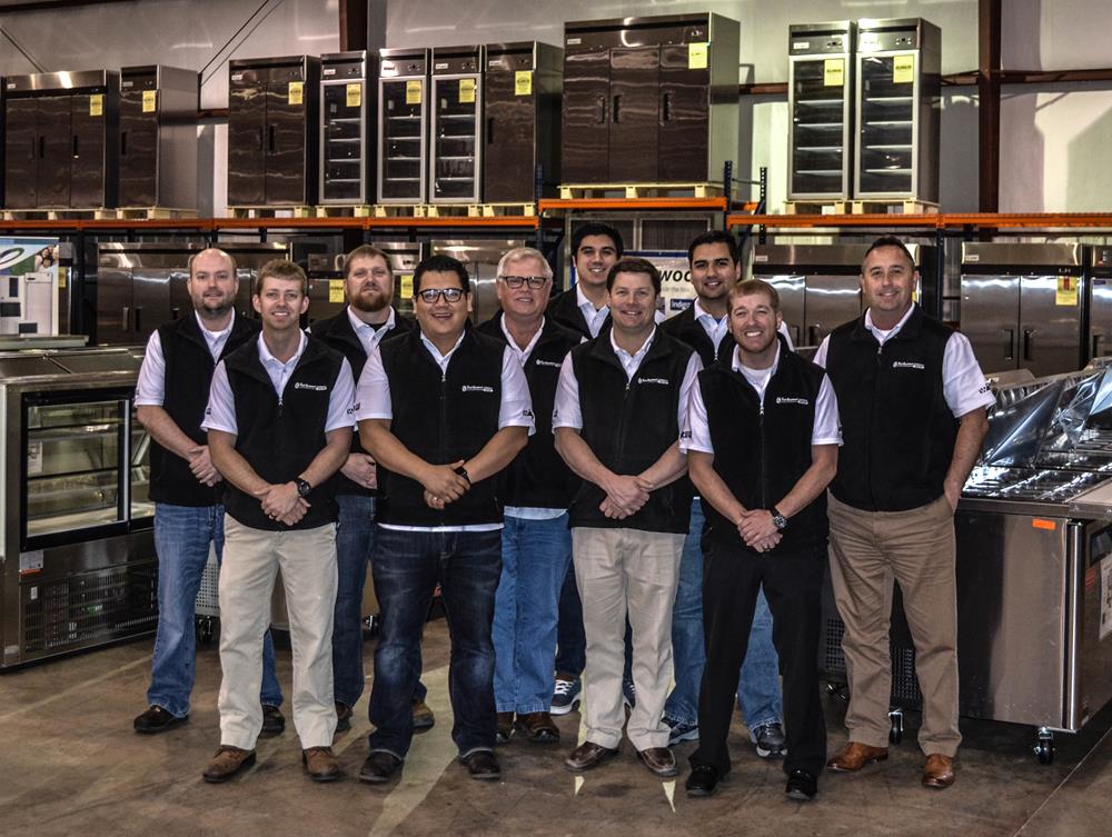 Customer photo from Kevin of our Port 50/50 Blend T-Shirt - Men's - Colors - Embroidered, a group of men in vests standing together