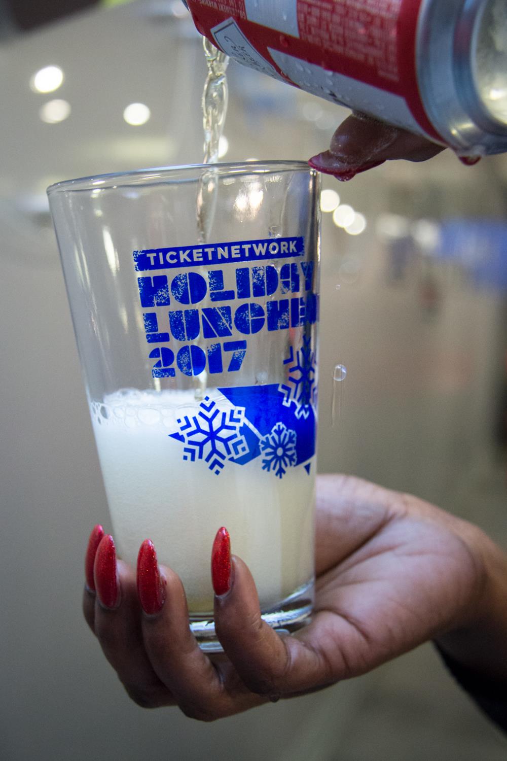 Customer photo from Monique of our Brew Pub Glass - 16 oz., a person pouring milk into a glass