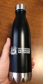 Customer photo from Christine of our h2go Force Vacuum Bottle - 17 oz., a hand holding a black bottle