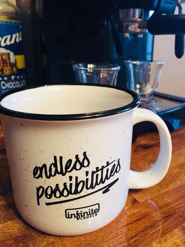 a white mug with black text on it