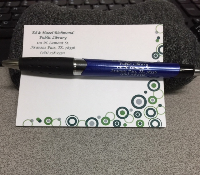 a pen on a business card