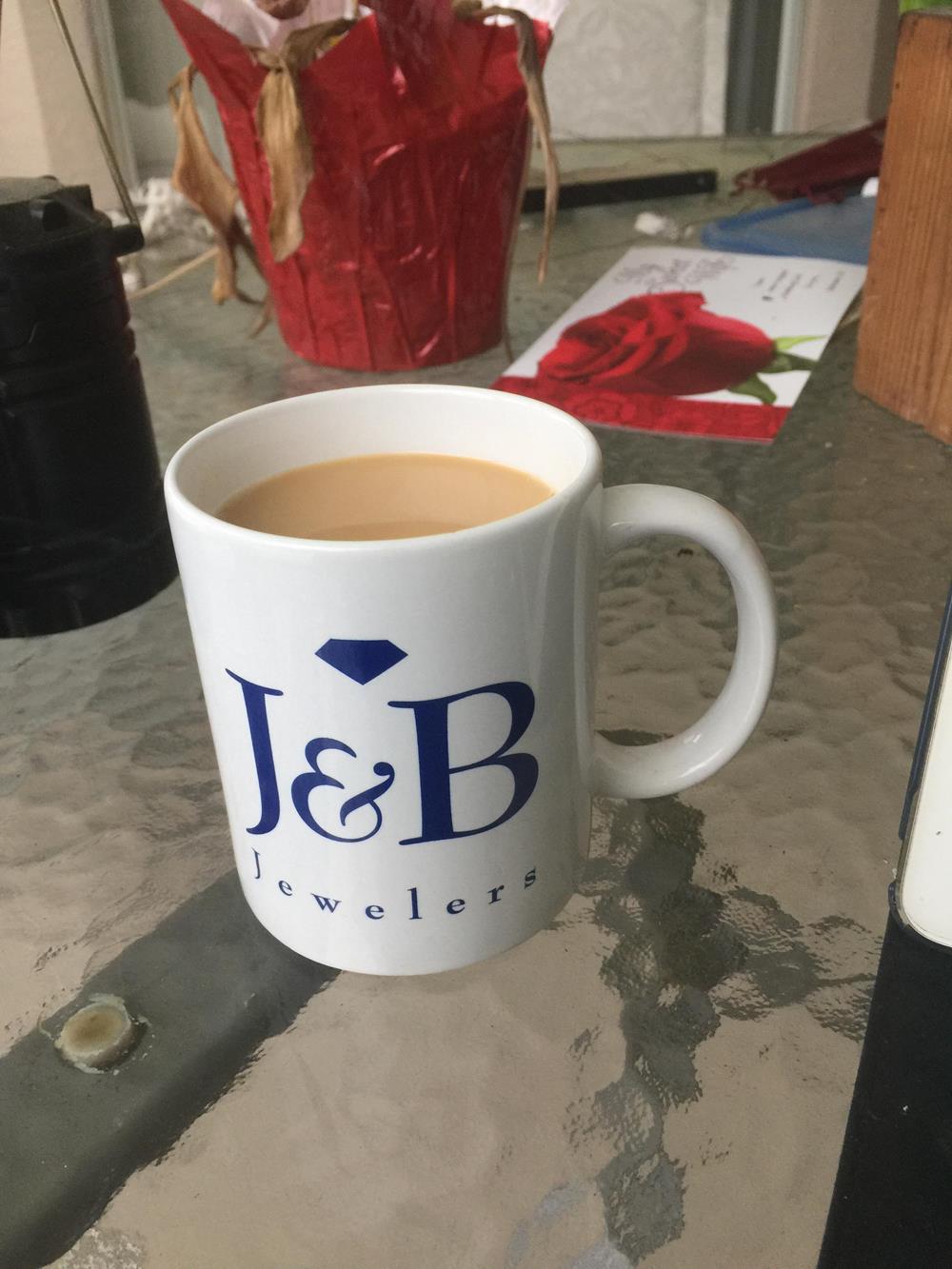 a coffee mug with a liquid in it